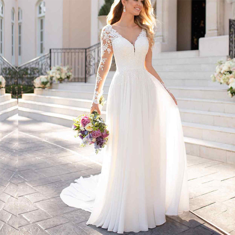 Vestido de novia con escote en V profundo y espalda descubierta